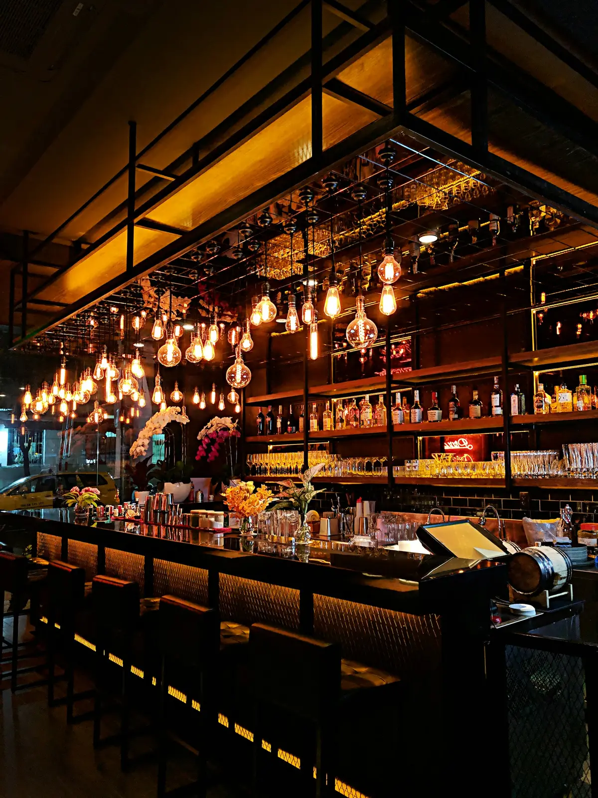 Warm bar with filament lights at Mlýnek