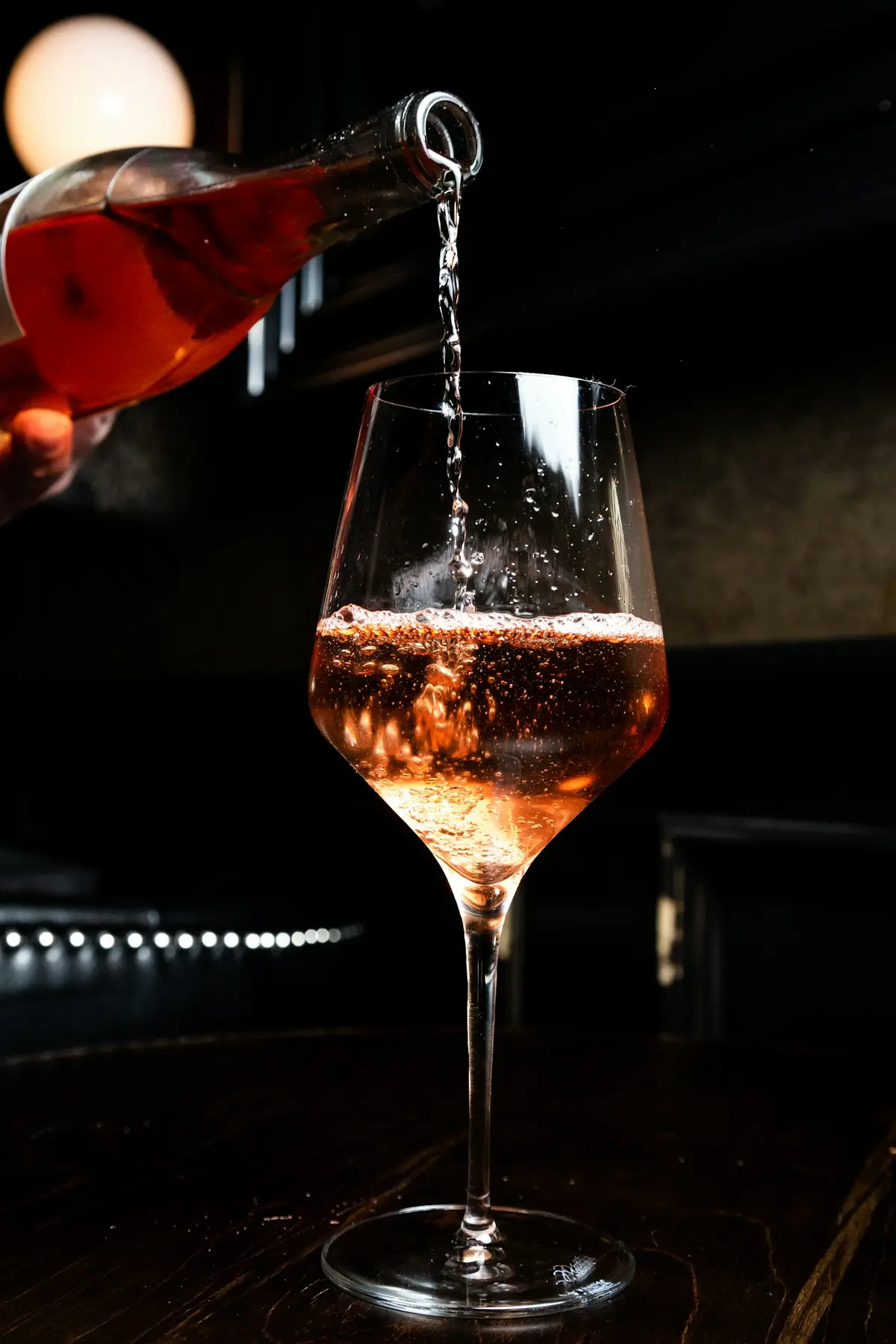 Wine being poured into a glass